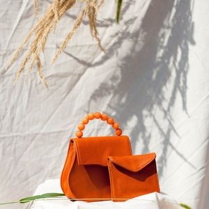 Eras mini belt bag in terracotta